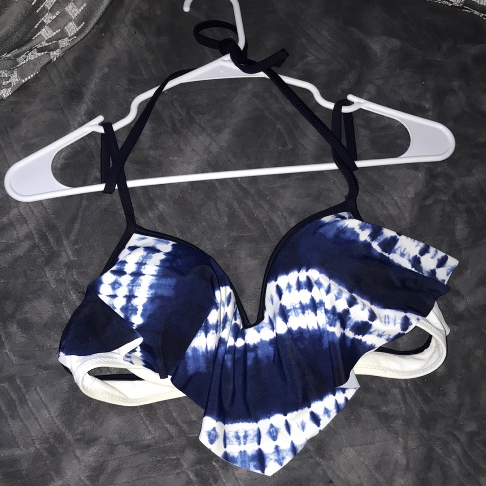 A tie dye looking bikini bra